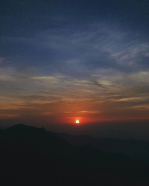 Sun kissing the Mountains