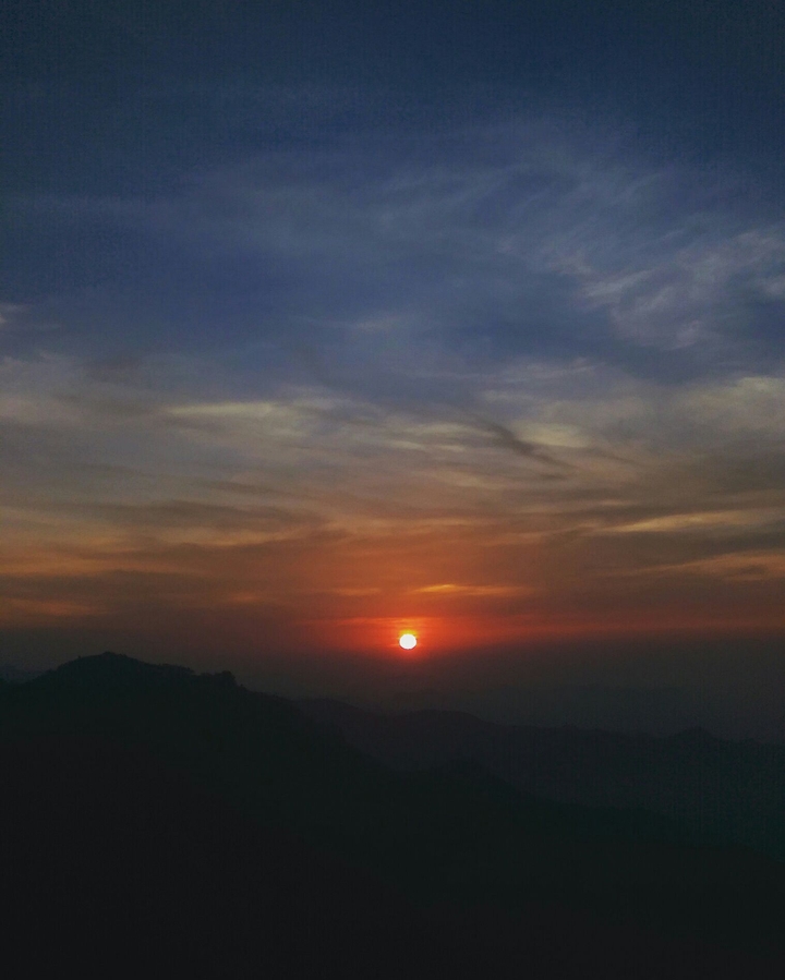 Sun kissing the Mountains