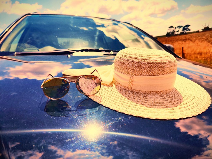 walk with sunglasses and hat on
