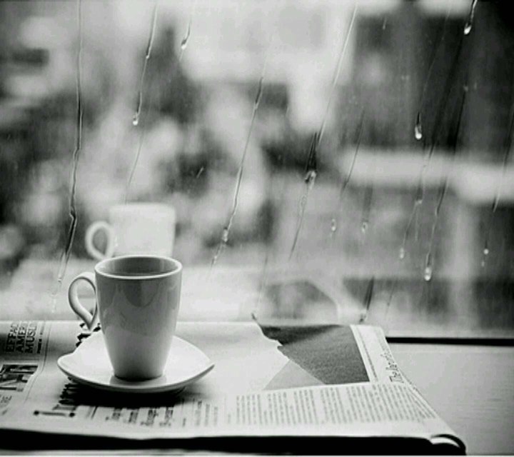 Black and white , Coffe and newspaper .