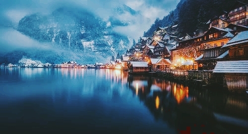 Lit Houses by Water