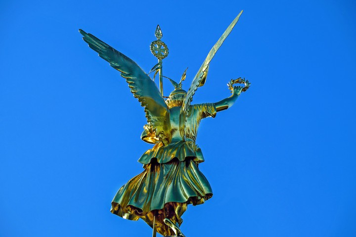 Bronze Statur and blue sky