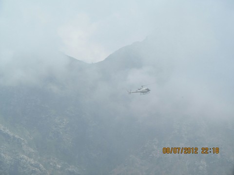 Helicopter in clouds