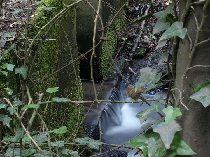 Amazing waterstream between stonewalls