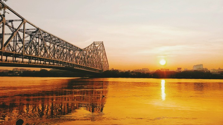 Sunrise at Ganga River beside Howrah Bridge