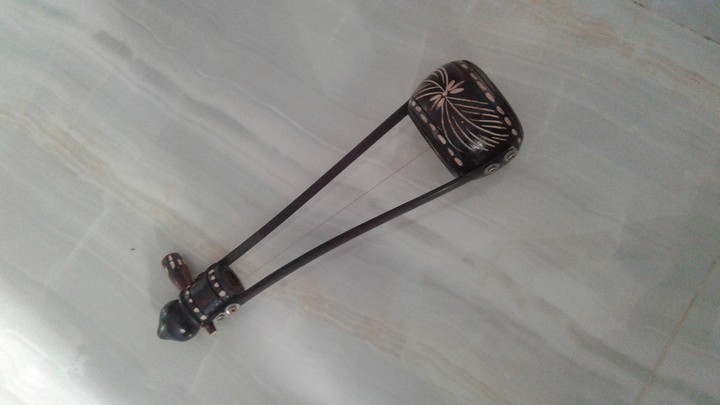 WOODEN MUSICAL INSTRUMENT