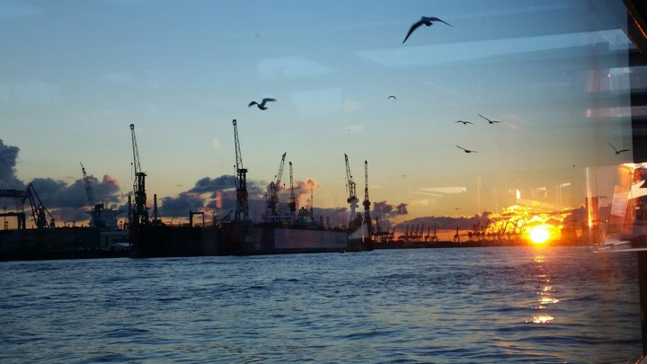 it's a great sunset at hamburg habour