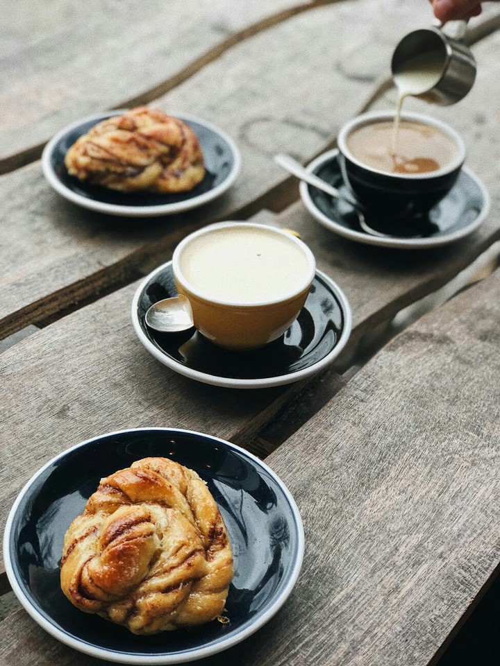 A Coffee Latté and a Delicious Cinnamon Rolls