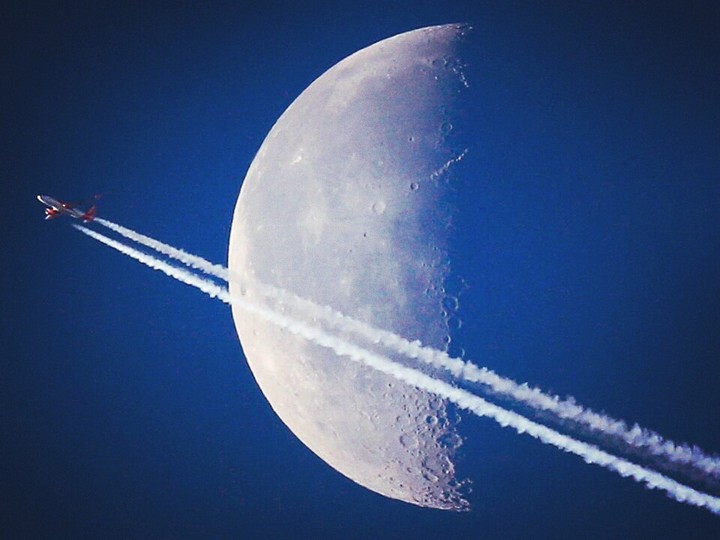 plain passing moon