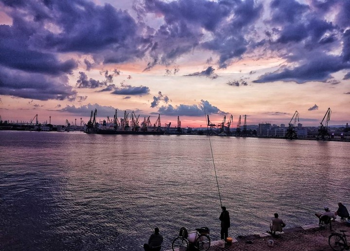 Purple clouds by the port