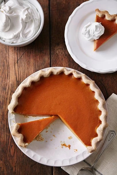 pumpkin pie with whipped cream