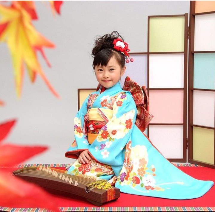 kimono-clad girl with koto