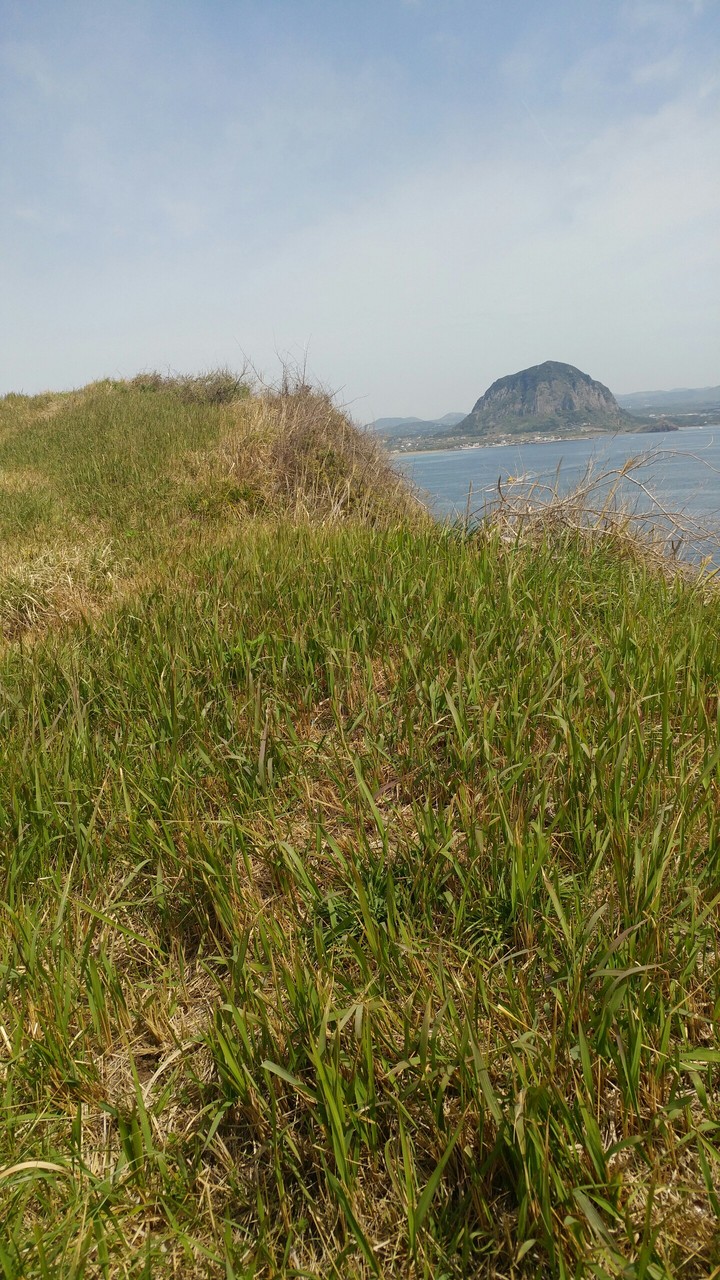 A large mountain beyond the hill