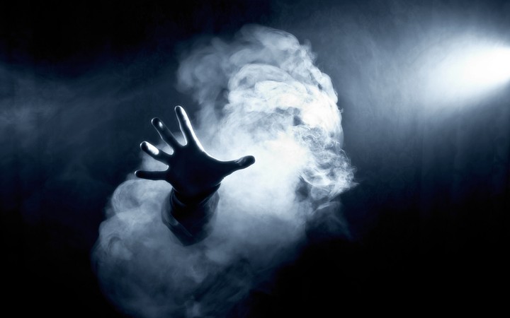Dark hand smoke