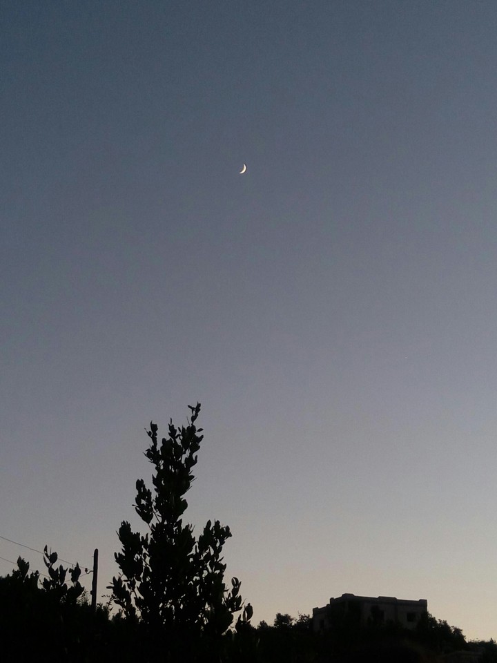 The moon at the sunset