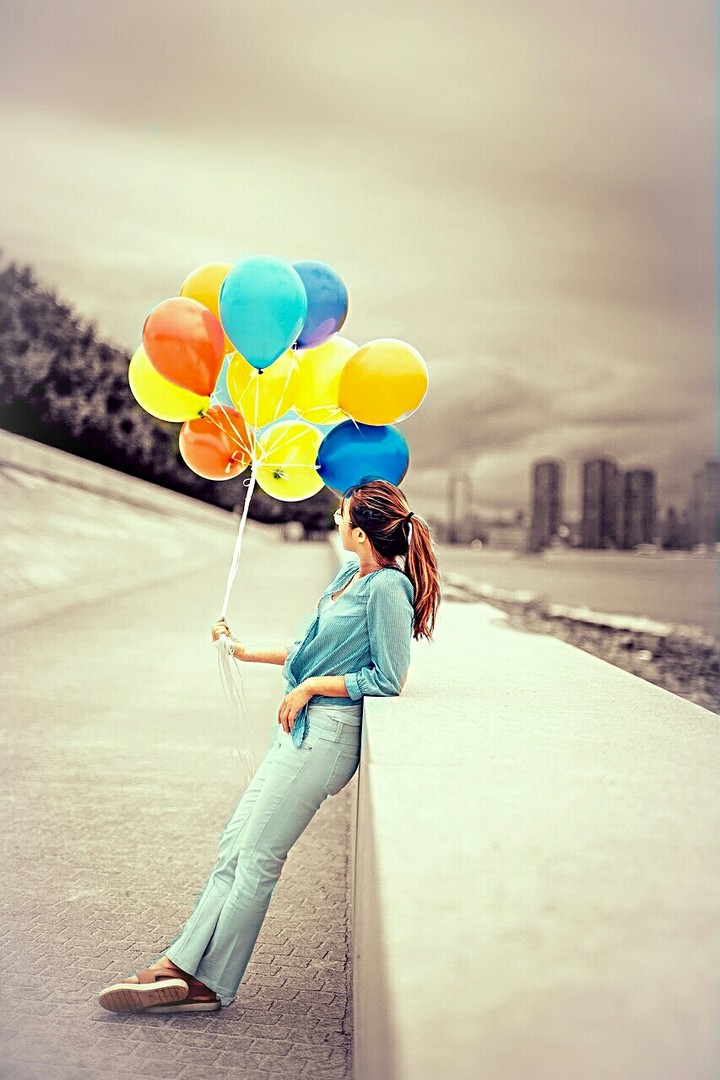 Beautiful girl and colorful baluns