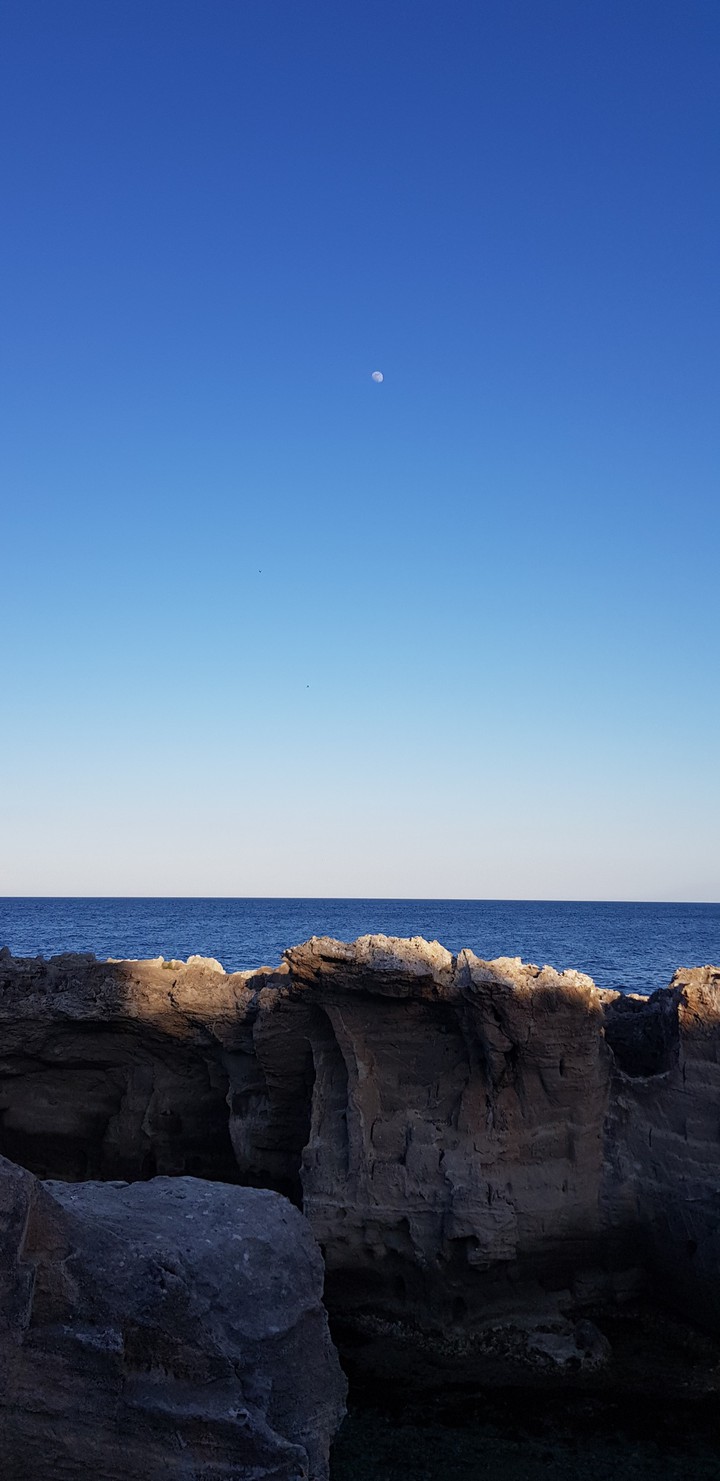 White moon and the rocks