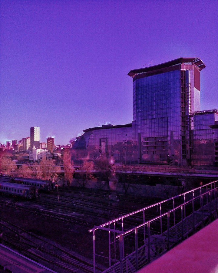 Город