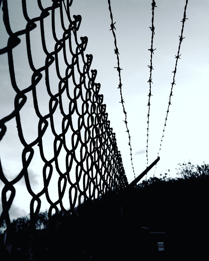 #behind the fence
