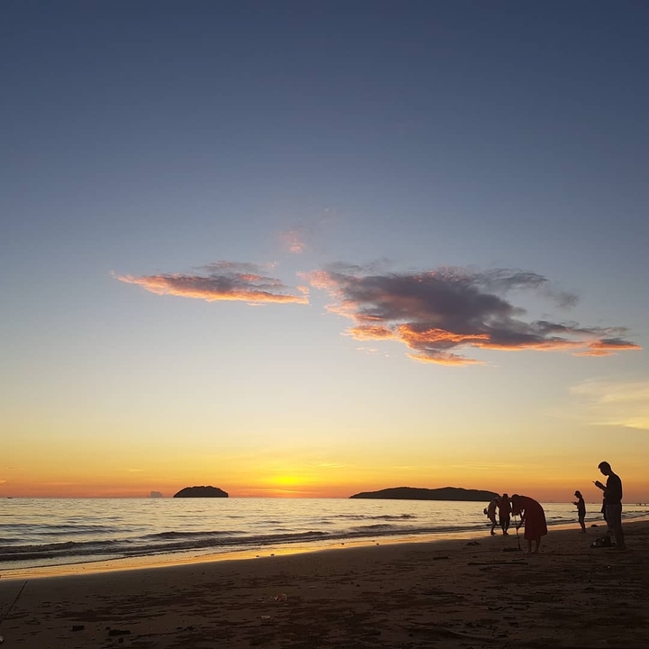tourists and sunset