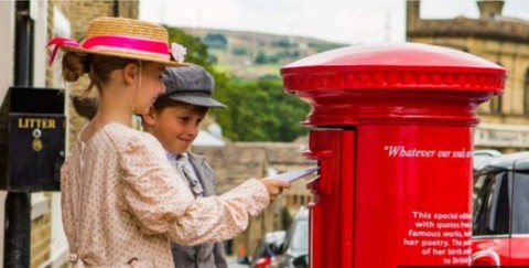 children posting a letter