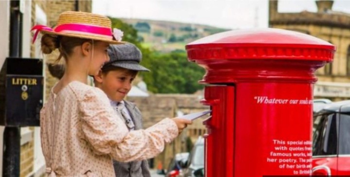 children posting a letter
