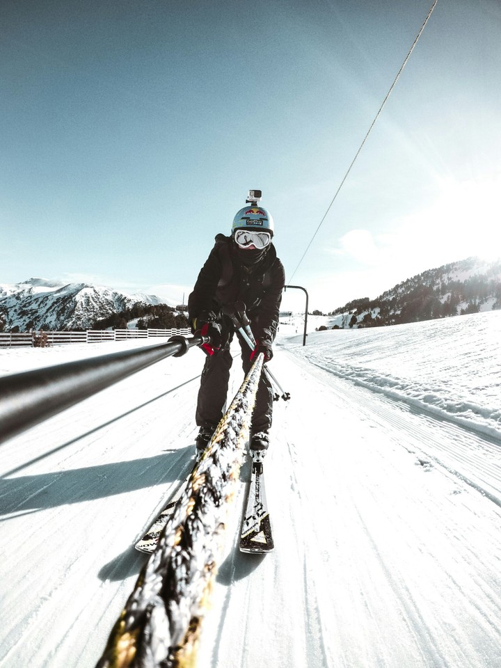 man snowblading