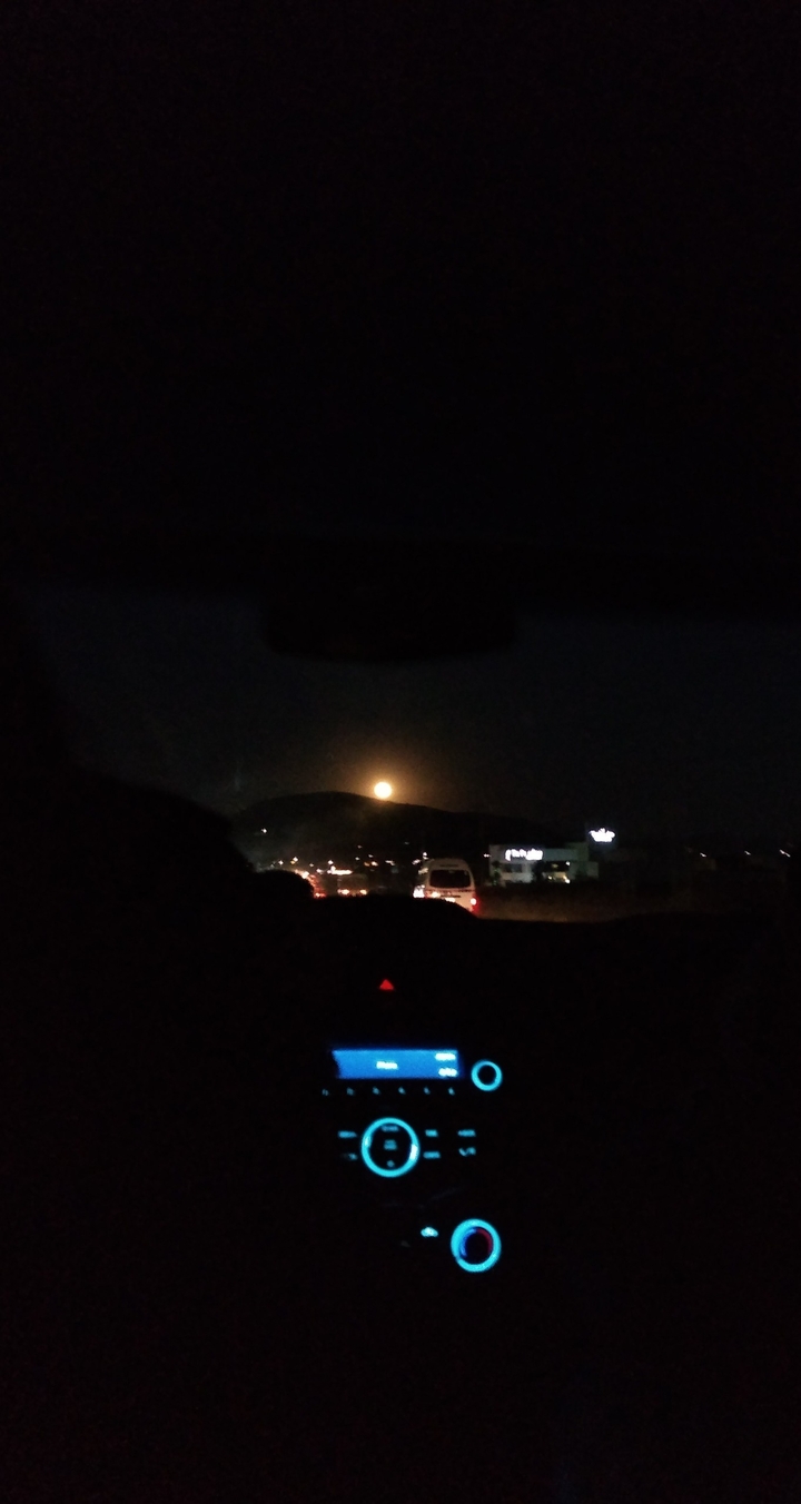 The moon in a car
