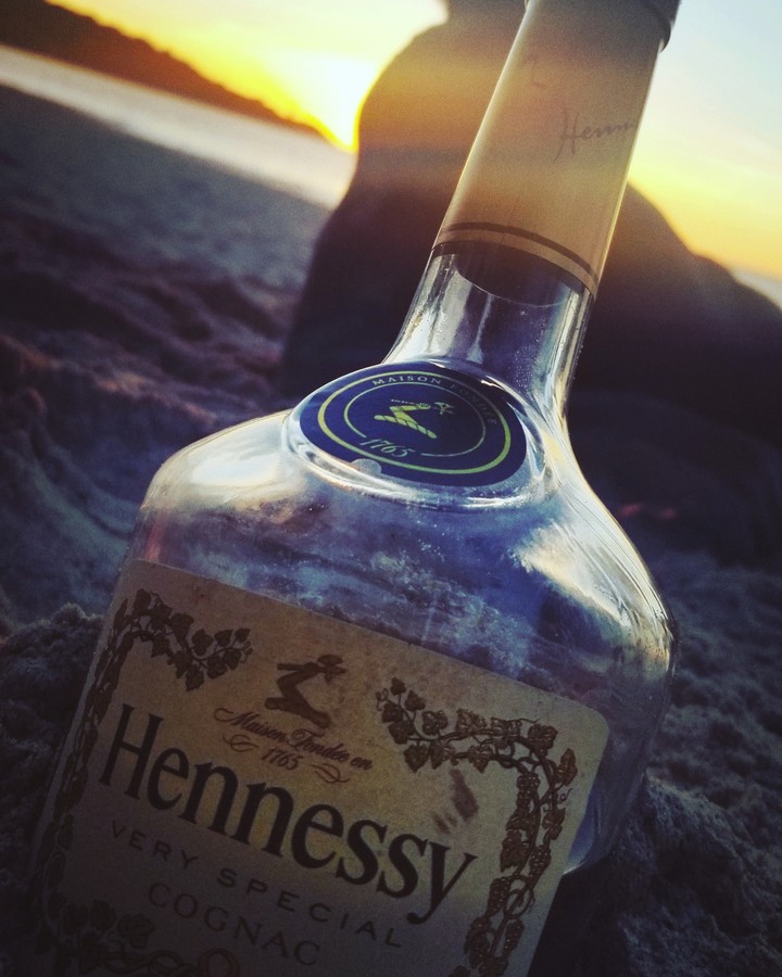 henny in my hand not even looking at the time??