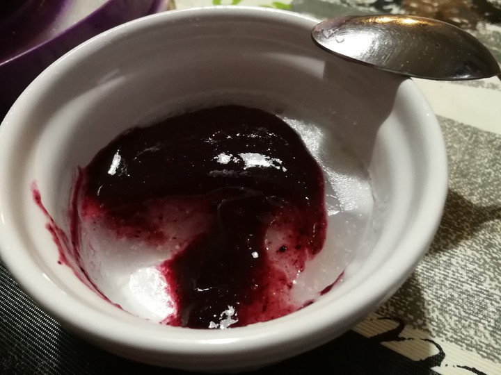 rice dessert and blueberry compote