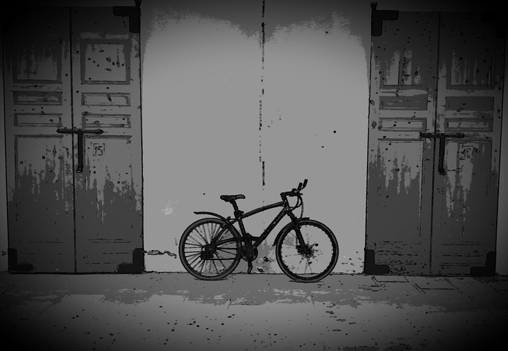 HUGE TRADITIONAL DOORS ; COOL MODERN BIKE