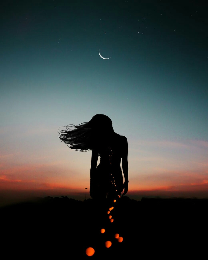 Silhouette of a Girl and a Beautiful Moon