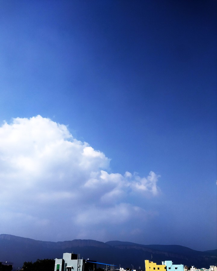 mountain and sky meet at a point