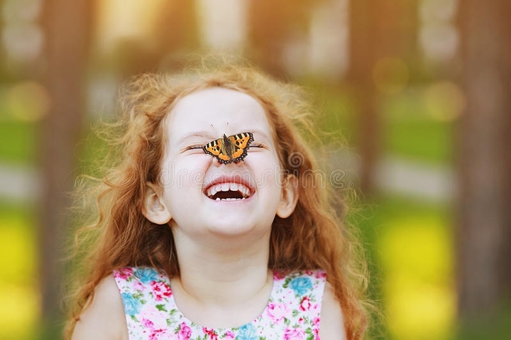 Laughing Girl with butterfly