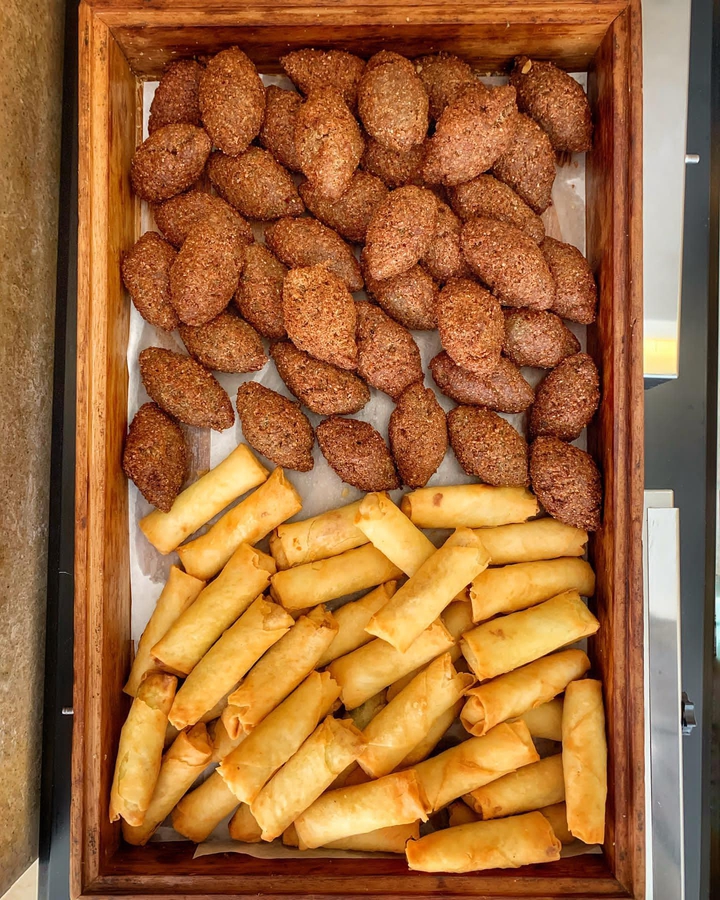 Grilled chicken, potatoes, kibbeh, and some sweets