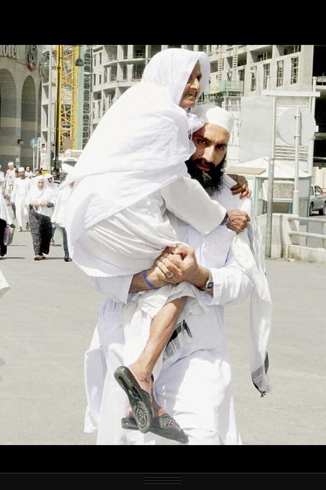Son Carrying to jumma - prayers - Madina