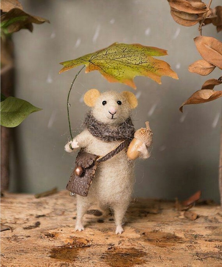 mouse under umbrella