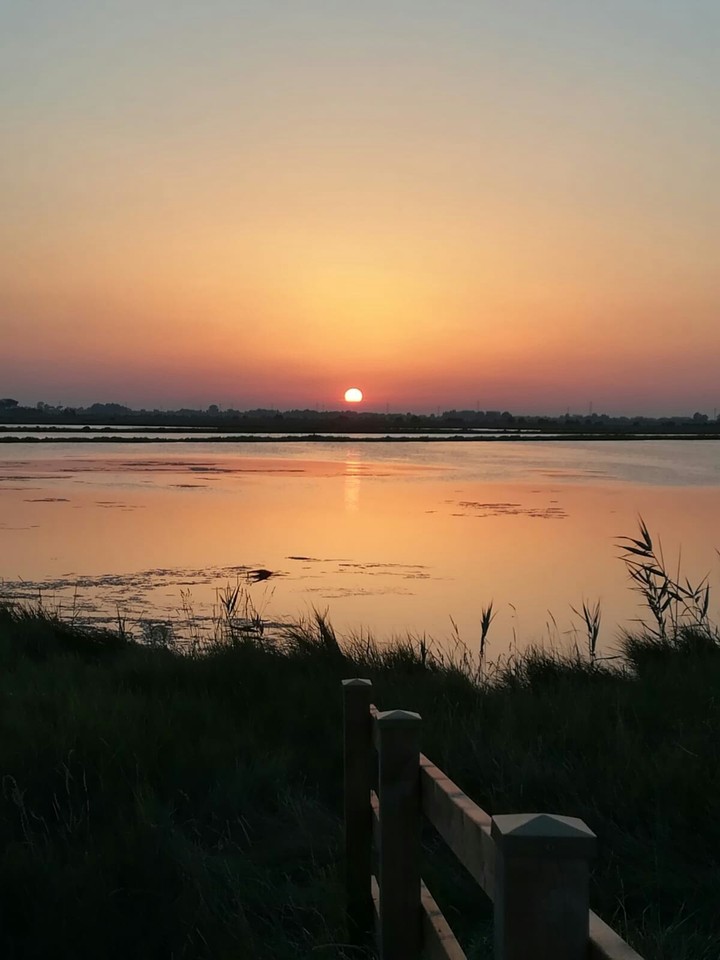 Sunset on the salt ponds in Cervia