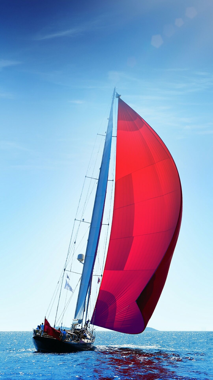 sailing with clear sky and blue waters