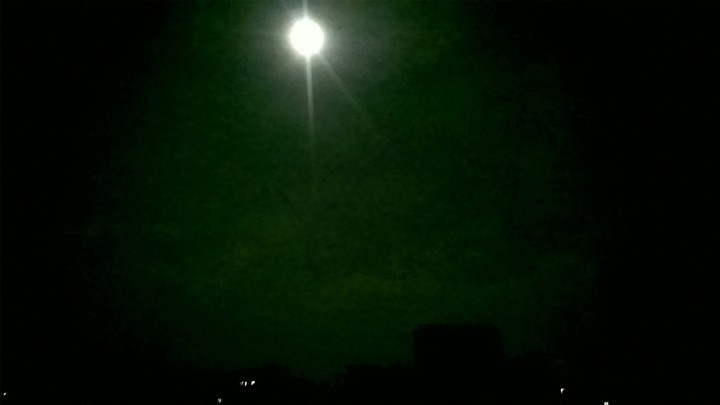 Moon above the city