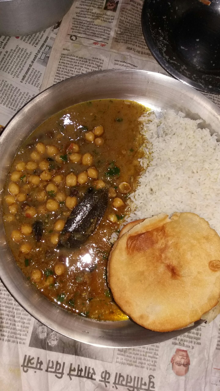 chhole bhature with plane rice