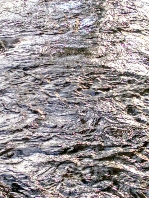 Ripples in moving water