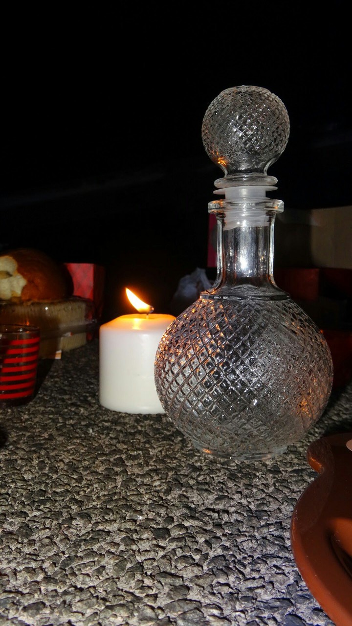 candle and glass