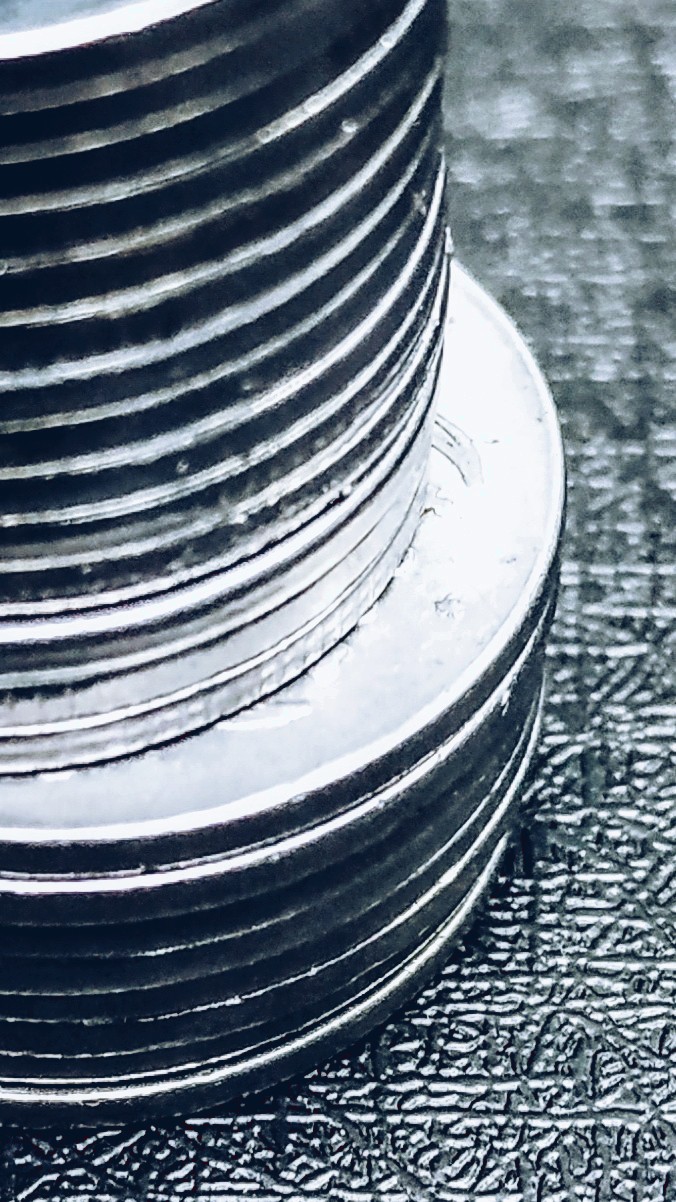 coins one on other
