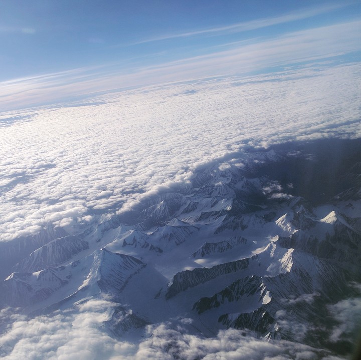 Mountains peeking through the clouds