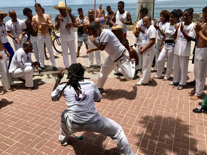 Capoeira mixes martial art, sport and music. Afro-brazilian
