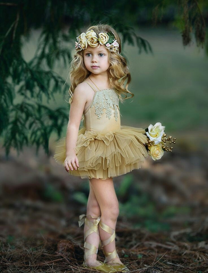 cute girl and gold color dress