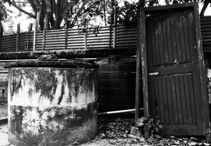 old well and a broken door.