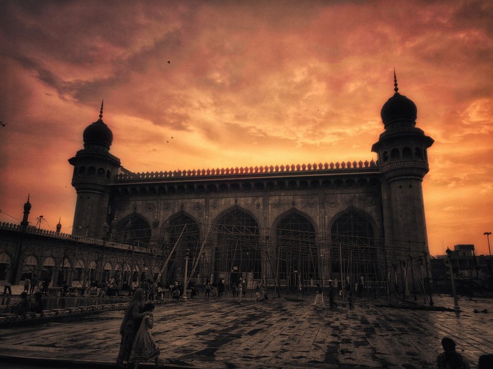 Fiery sunset across Mecca Masjid, Hyderabad, India