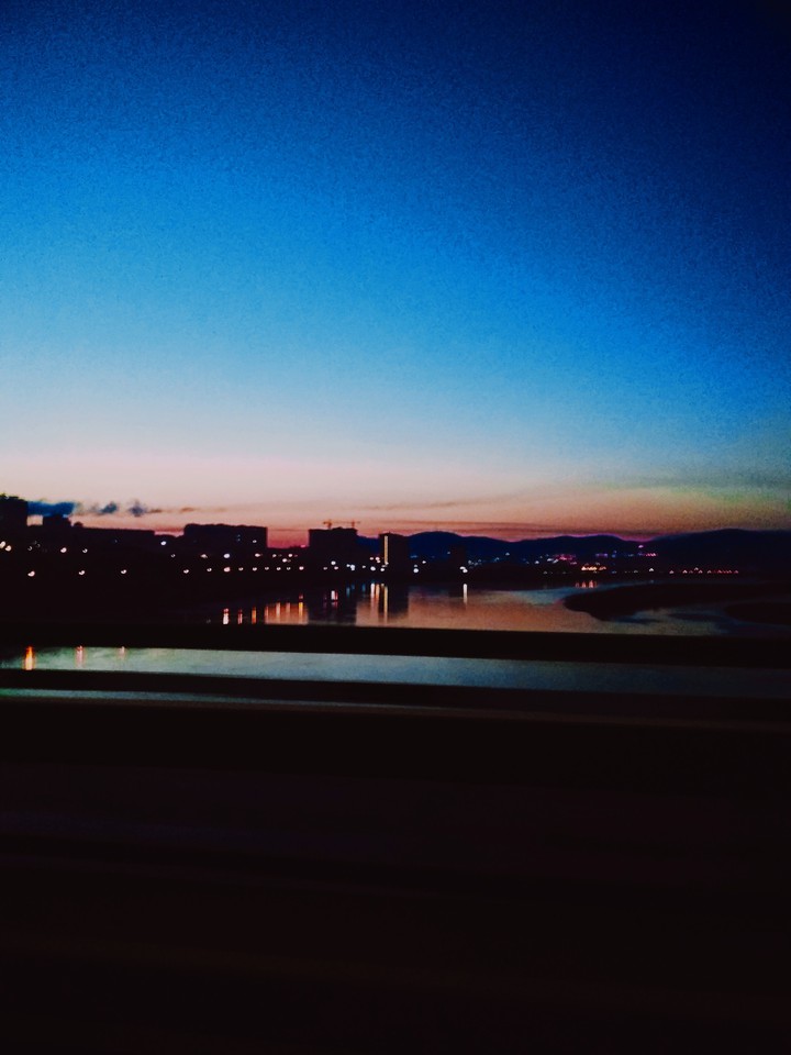 город